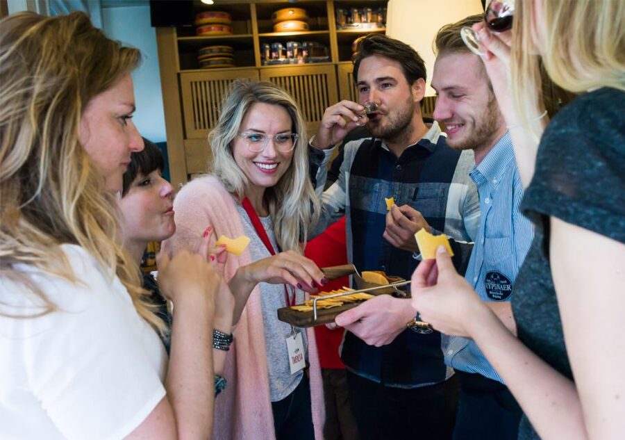 Amsterdam: Guided Cultural Food Tour in German or English - Magna Plaza and the changing city center