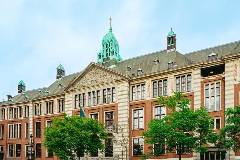 Amsterdam: Guided Cultural Walking Tour - Torensluis, the tiny house, and colonial-era questions