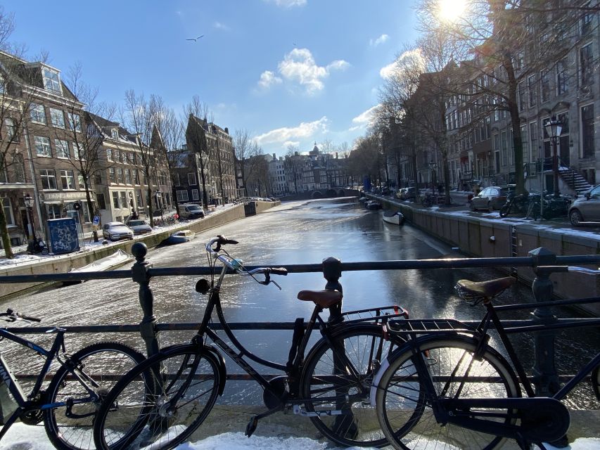Amsterdam: Guided Off-The-Beaten-Track Walking Tour - Starting at Beursplein and finding your Amsterdam bearings