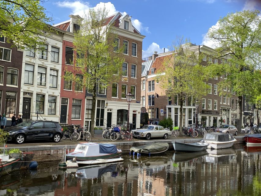 Amsterdam: Guided Off-The-Beaten-Track Walking Tour - Herengracht and Prinsengracht, Amsterdam’s postcard canals with context