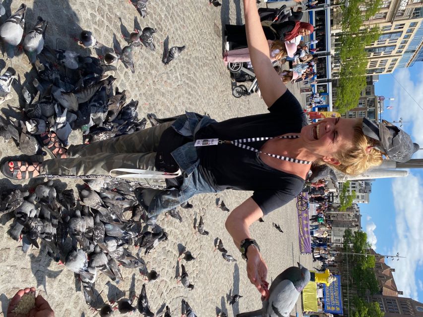 Amsterdam: Guided Off-The-Beaten-Track Walking Tour - Torensluis and the canal belt’s first clues