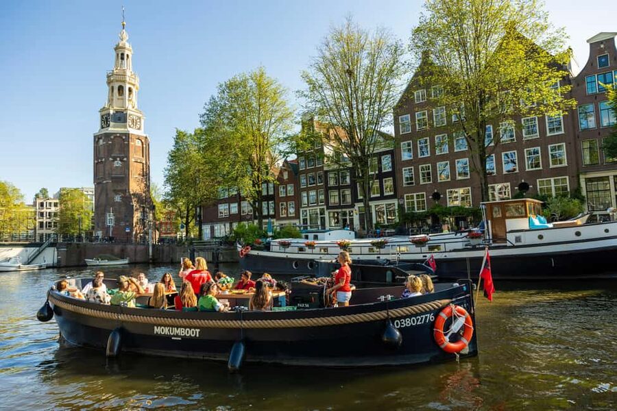 Amsterdam: Guided Open Boat Canal Cruise Including Drink - The canal belt and the seven-bridge view