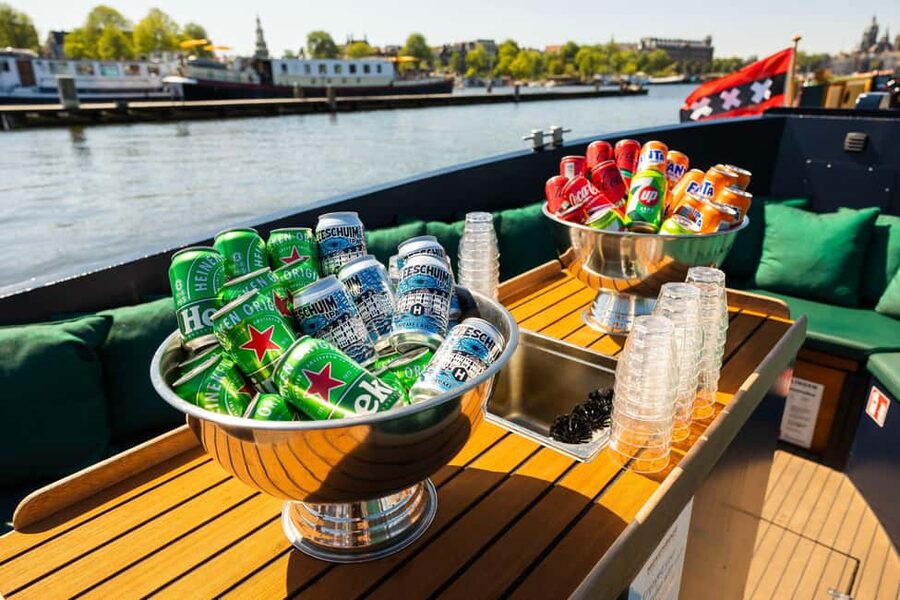 Amsterdam: Guided Open Boat Canal Cruise Including Drink - Starting at Amsterdam Centraal