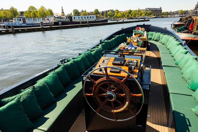 Amsterdam: Guided Open Boat Canal Cruise Unlimited Drinks Option - Key points to know before booking
