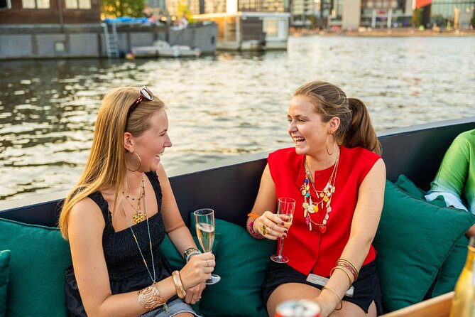Amsterdam: Guided Open Boat Canal Cruise Unlimited Drinks Option - The open boat, drinks, and comfort