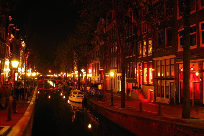 Amsterdam: Guided Red Light District and City Walking Tour - The Smallest House and the Story of Trade
