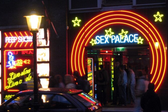 Amsterdam: Guided Red Light District and City Walking Tour - The Condomerie and Amsterdam’s Matter-of-Fact Humor