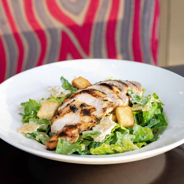 Amsterdam: Hard Rock Cafe Experience - The setting: rock memorabilia beside the canal
