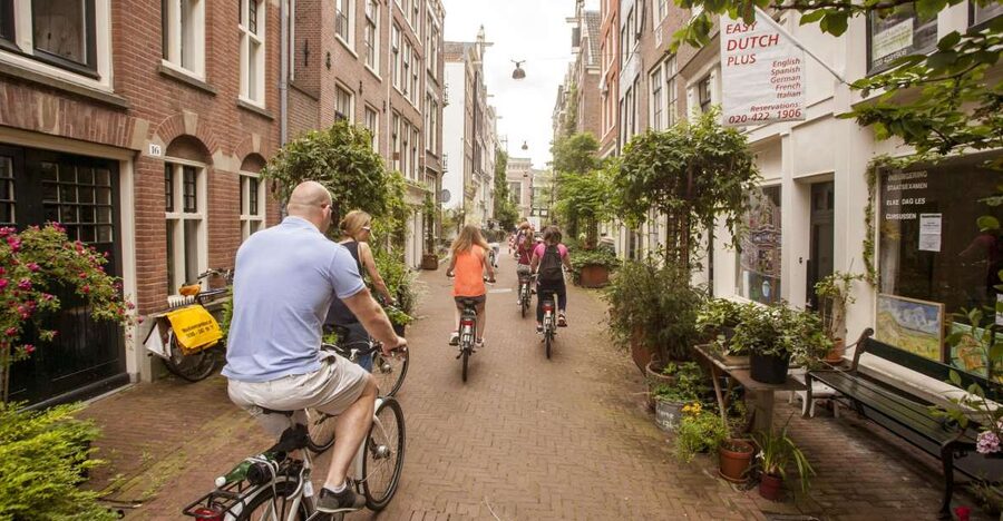 Amsterdam: Hidden Gems & Highlights Guided Bike Tour - Why begin Amsterdam on two wheels?