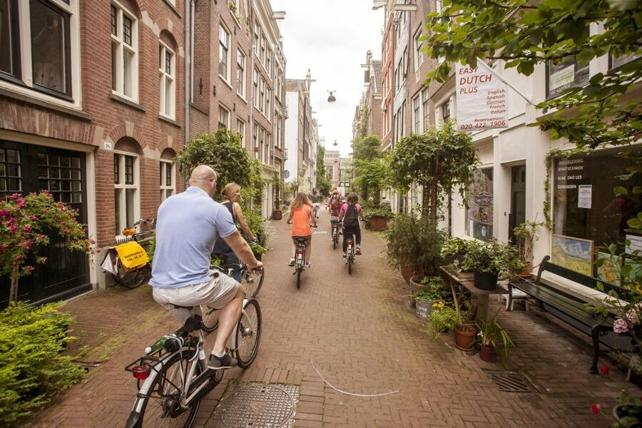 Amsterdam: Hidden Gems & Highlights Guided Bike Tour - Anne Frank’s House and a serious moment