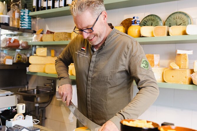 Amsterdam High-End Dutch Food & History Tour - Up to 8 guests - Fish shop classics: herring, cod, and smoked eel