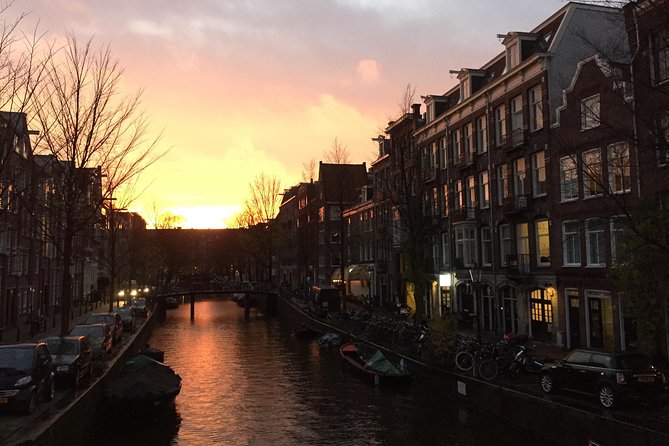 Amsterdam Highlights Walking Tour: Small Group Experience - Canals, gabled houses, and reclaimed land