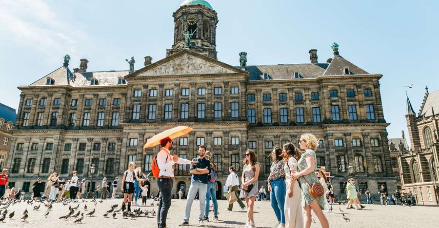 Amsterdam: Historical Highlights Walking Tour with Tasting - The Mint Tower, Flower Market, and Amstel River