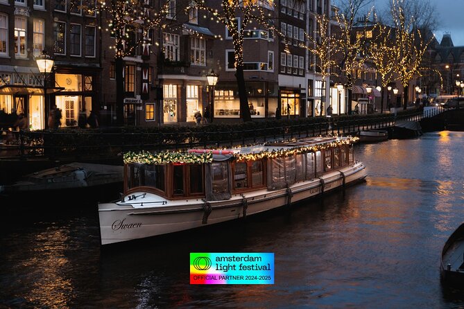 Amsterdam Light Festival: Heated Boat Cruise + Hot Drinks & Bite - Seeing Amsterdam Light Festival from the water
