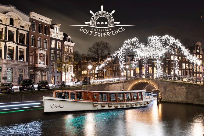 Amsterdam Light Festival: Heated Cruise with Hot Drinks & Bite - Boarding the boat at the canal