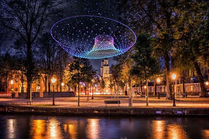 Amsterdam Light Festival Private Cruise With Welcome Drink - The houseboat area and Amsterdam’s waterfront character