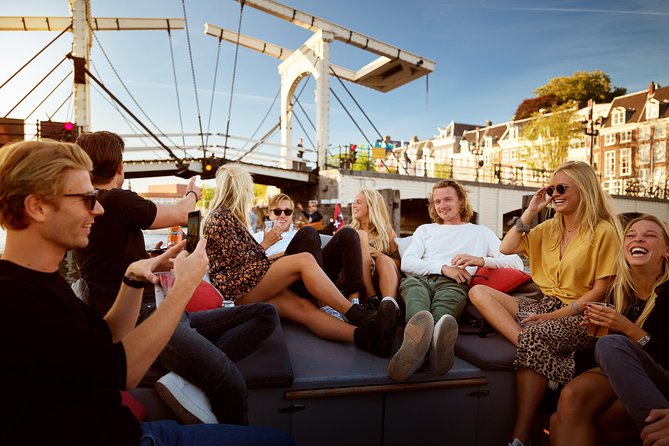 Amsterdam Light Festival: Saloon Boat Cruise + Hot Drinks & Bite - Starting near the National Maritime Museum
