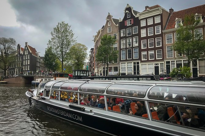 Amsterdam Live Guided Sightseeing Canal Cruise - The Hermitage Museum and Skinny Bridge