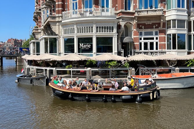 Amsterdam Luxury Boutique Boat tour with Unlimited Beer and Wine - Covered boat or open boat?