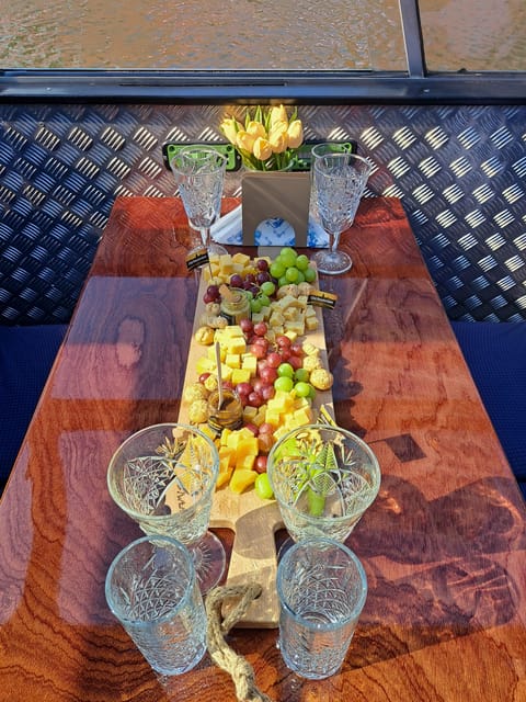 Amsterdam: Luxury Cheese & Wine Canal Cruise - Wine, Heineken, coffee, and tea on board