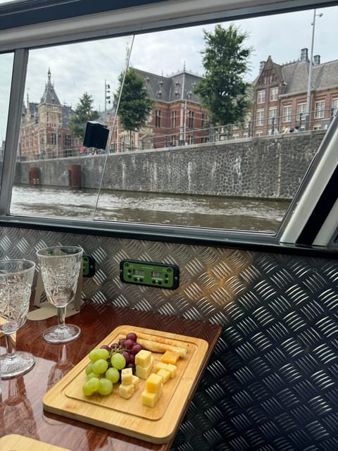 Amsterdam: Luxury Cheese & Wine Canal Cruise - The guide and the mood on board