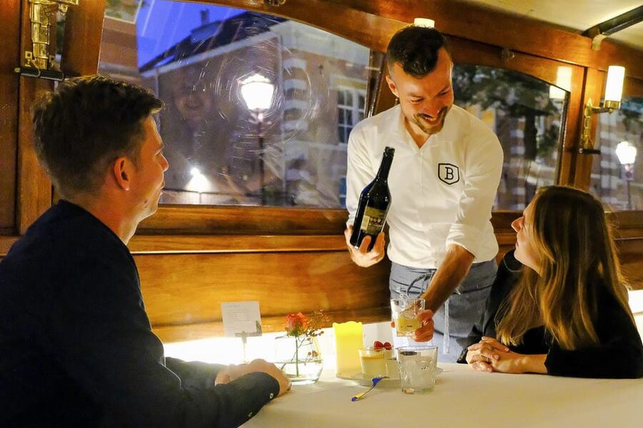 Amsterdam: Luxury Saloon Boat Cruise with 3-Course Dinner - A Festive Aperitif Before Departure