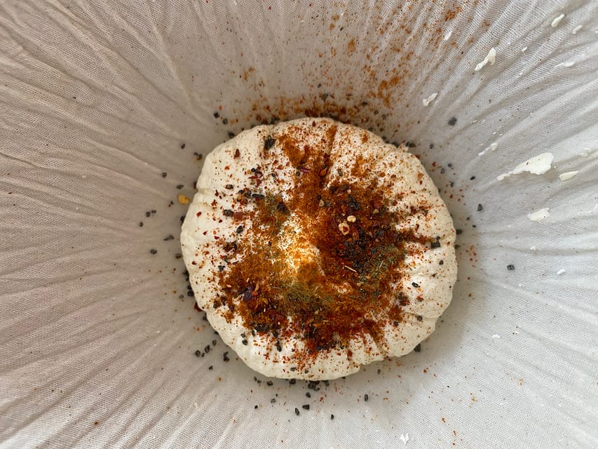 Amsterdam: Make your cheese next to De Hallen - Adding herbs, spices, and your own judgment
