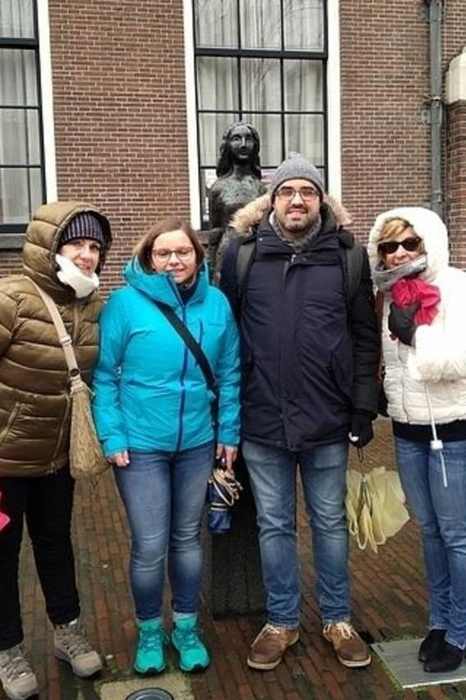 Amsterdam: Must-See Attractions Guided Walking Tour - The canals and Amsterdam’s narrow houses
