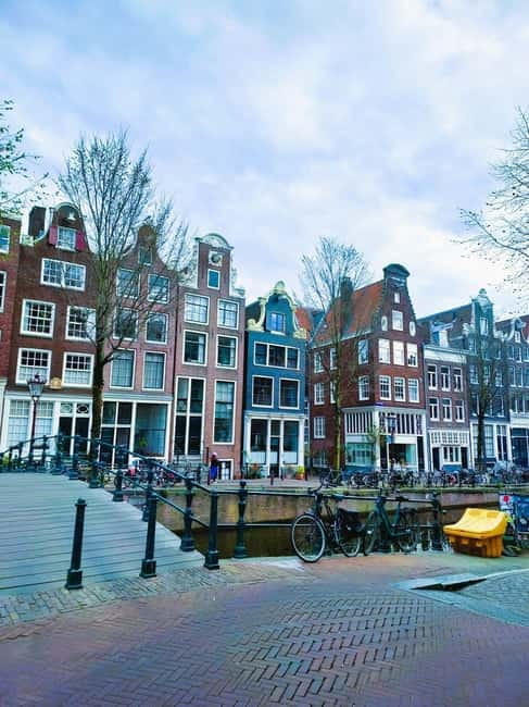 Amsterdam: Off the Beaten Path Bike Tour in French - Entrepotdok and Plantage reveal a quieter side