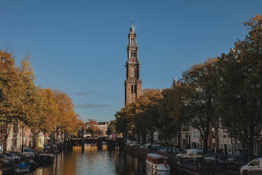 Amsterdam: Open Boat Cruise option Unlimited Drinks & Bite - Open-air comfort, evening cold, and group atmosphere