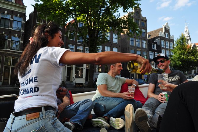 Amsterdam Open Boat Cruise with Live Guide and Two Drinks - Jordaan, Westerkerk, and the Anne Frank House