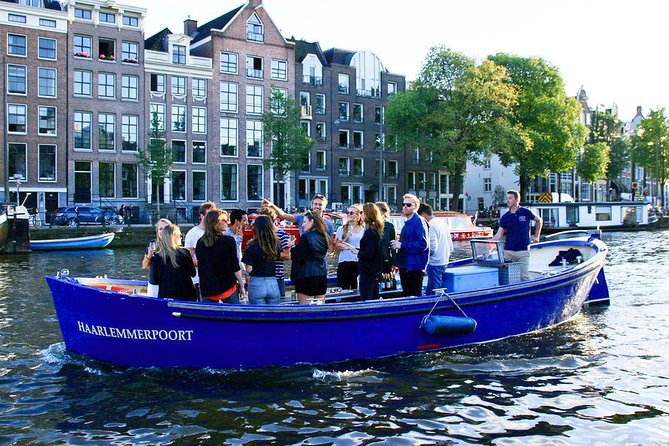 Amsterdam Open Boat Sightseeing Canal Cruise - The Amstel Hotel and NEMO Science Museum