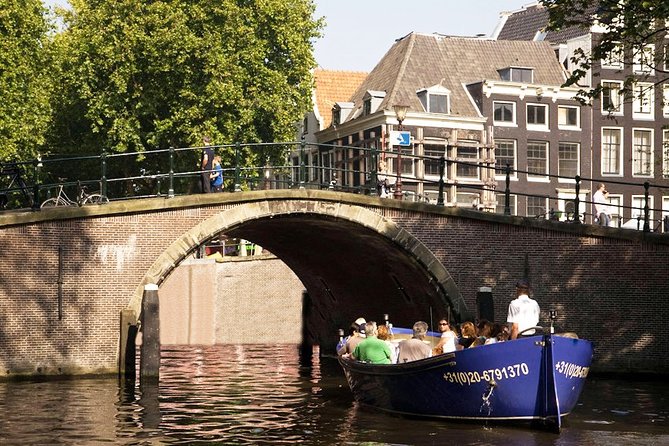 Amsterdam Open Boat Sightseeing Canal Cruise - Weather, Cancellations, and Timing