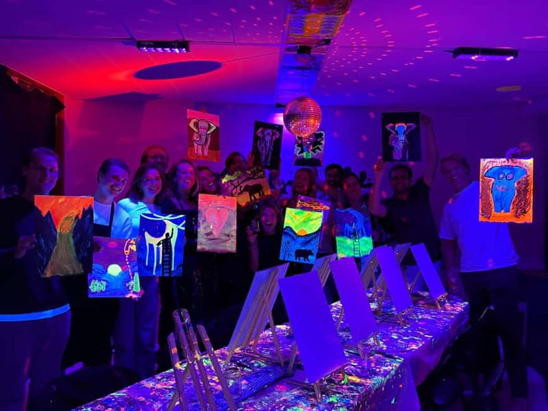 Amsterdam: Paint and Sip in the Dark at Rembrandt van Wine - The dark-room twist changes the usual art class