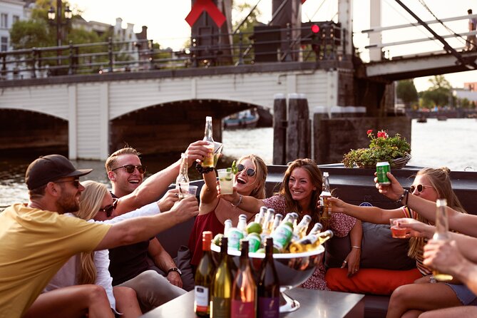 Amsterdam Private Boat Tour with Unlimited Drinks - Unlimited drinks, comfort, and the boat itself