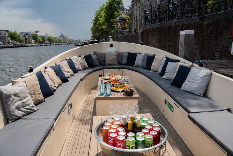 Amsterdam: Private Canal Booze Cruise with Unlimited Drinks - Meeting at Amstel 178