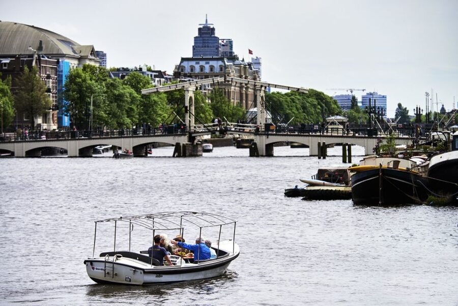 Amsterdam: Private Canal Tour - The river and port add a different side of the city