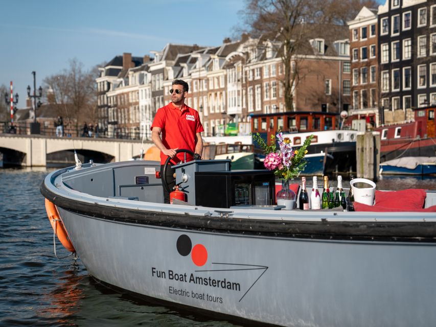 Amsterdam: Private Luxury Cruise with Drinks & Silent Disco - Meeting behind the Apple store