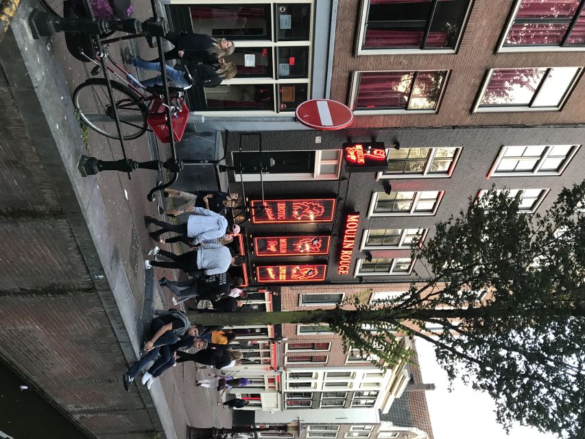 Amsterdam: Private Red Light District and Food Tour - Canals, Nieuwmarkt, and Amsterdam’s everyday setting