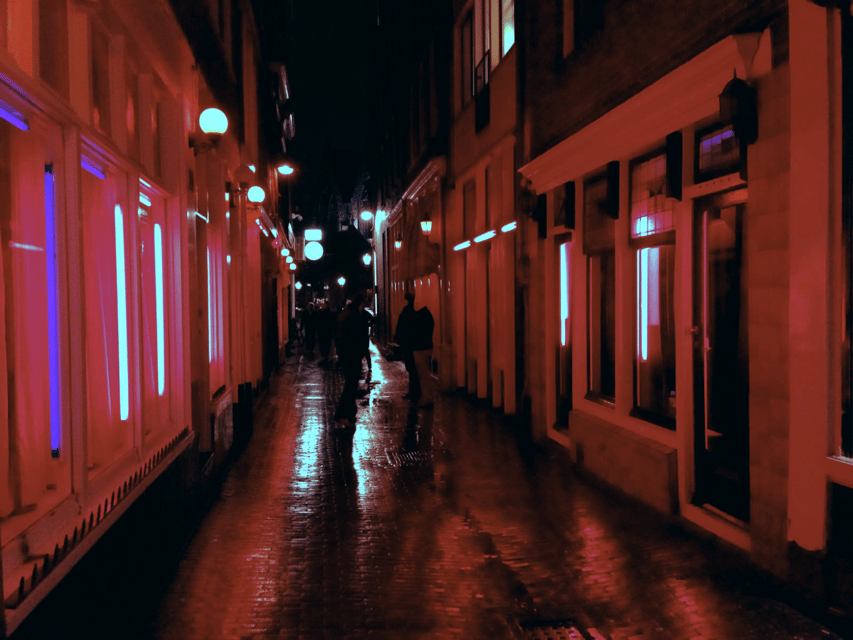 Amsterdam: Private Red Light District Tour in Spanish - The Condomerie and the final walk to Dam Square