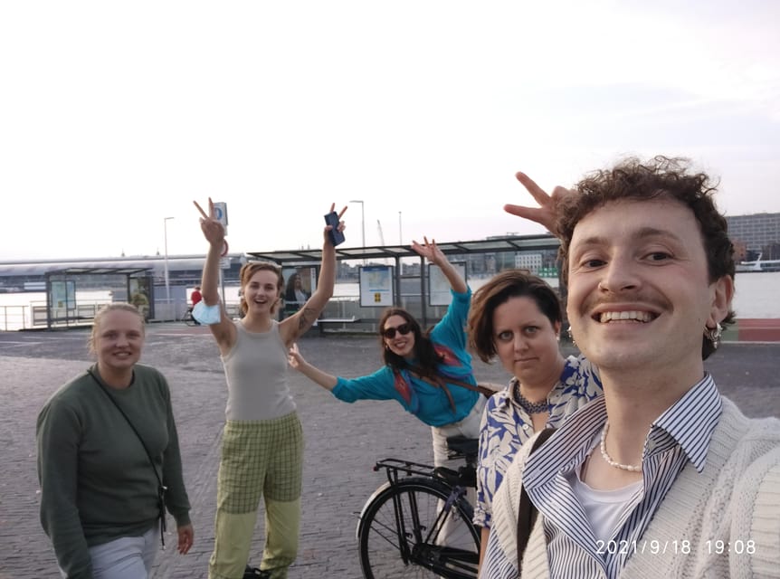Amsterdam: Rainbow Rural Bike Tour With Local Gay Guide - From green fields to the old industrial harbor
