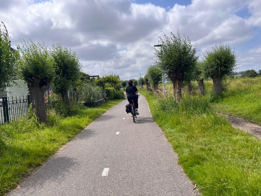 Amsterdam: Rainbow Rural Bike Tour With Local Gay Guide - Sanne’s guiding style and queer welcome
