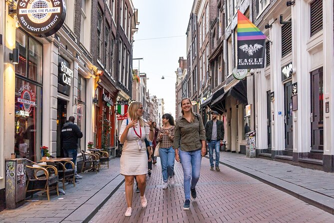Amsterdam: Red Light District & City Tour (Private tour) - Damrak, the old harbor, and direct questions