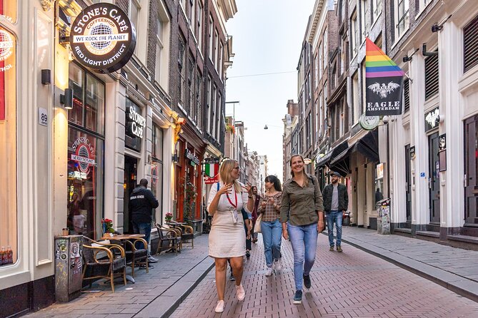 Amsterdam Red Light District Walking Tour in EN/DE/IT/ES - Old harbor questions: law, prices, and window rentals