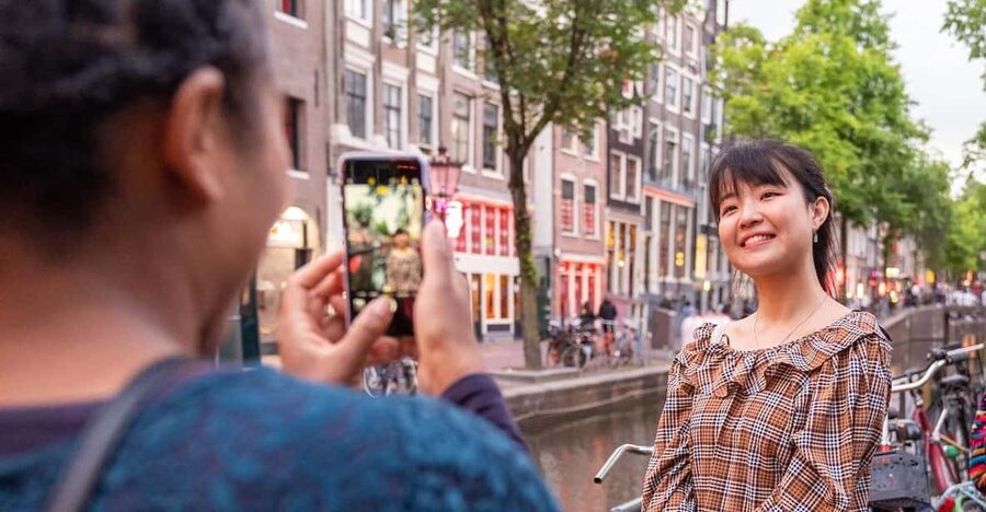 Amsterdam: Red Light Tour Exclusive + Peep Show - The Condomerie and Oude Kerk