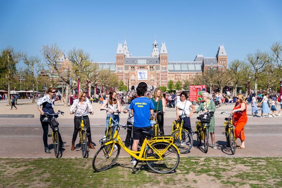 Amsterdam: Relaxed City Highlights Guided Bike Tour - Starting near Central Station and the canal belt