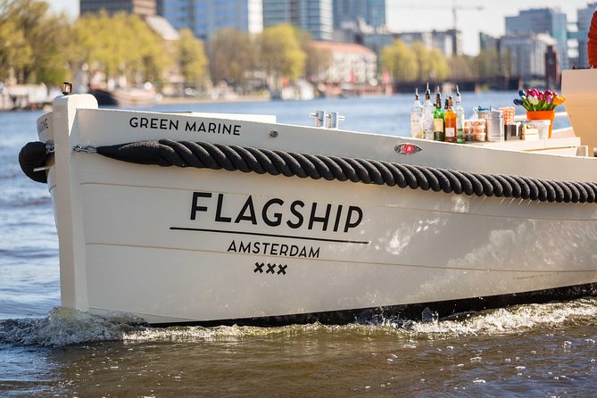 Amsterdam: Saloon Boat Cruise + Unlimited Drinks & Bite option - The Drunken Houses and other odd canal stories