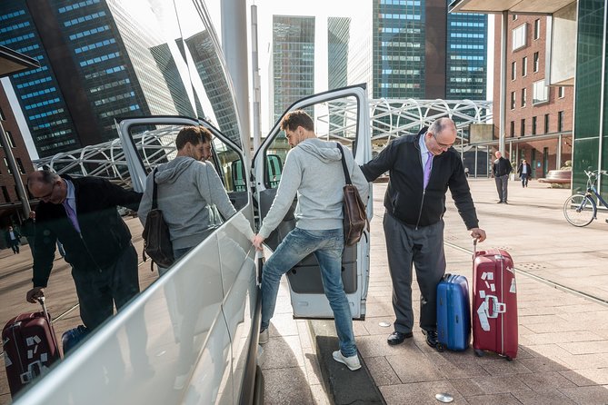 Amsterdam Schiphol Airport (AMS) Round Trip transfer to Amsterdam City - Private transport versus a cheaper option