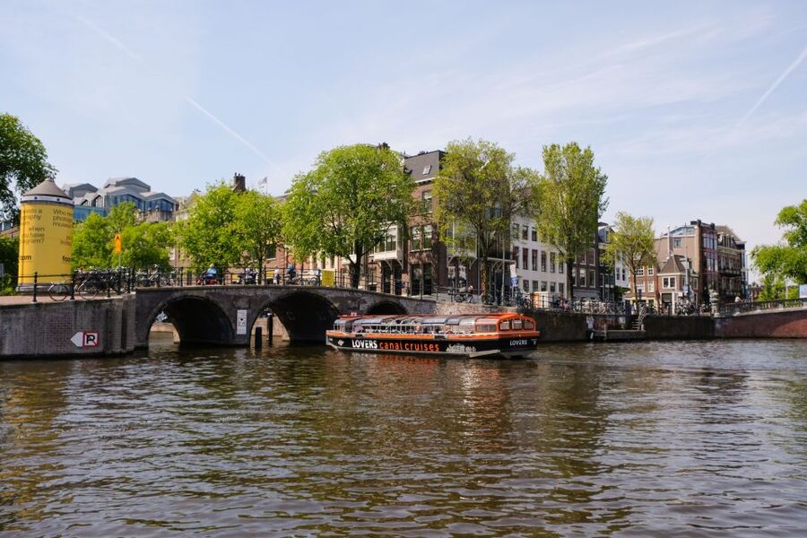 Amsterdam: Semi-Open Canal Boat Cruise - The first part of the route: Amsterdam from canal level