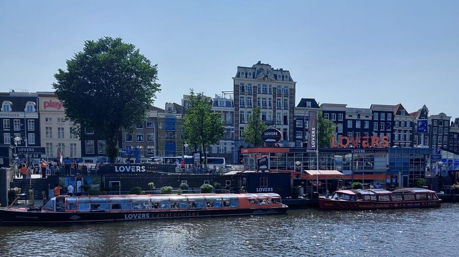 Amsterdam Shore Excursion: Highlights Walk & Canal Cruise - Seeing Amsterdam from a glass-top boat